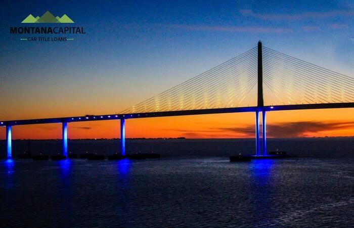 A bridge with lights on it

Description automatically generated