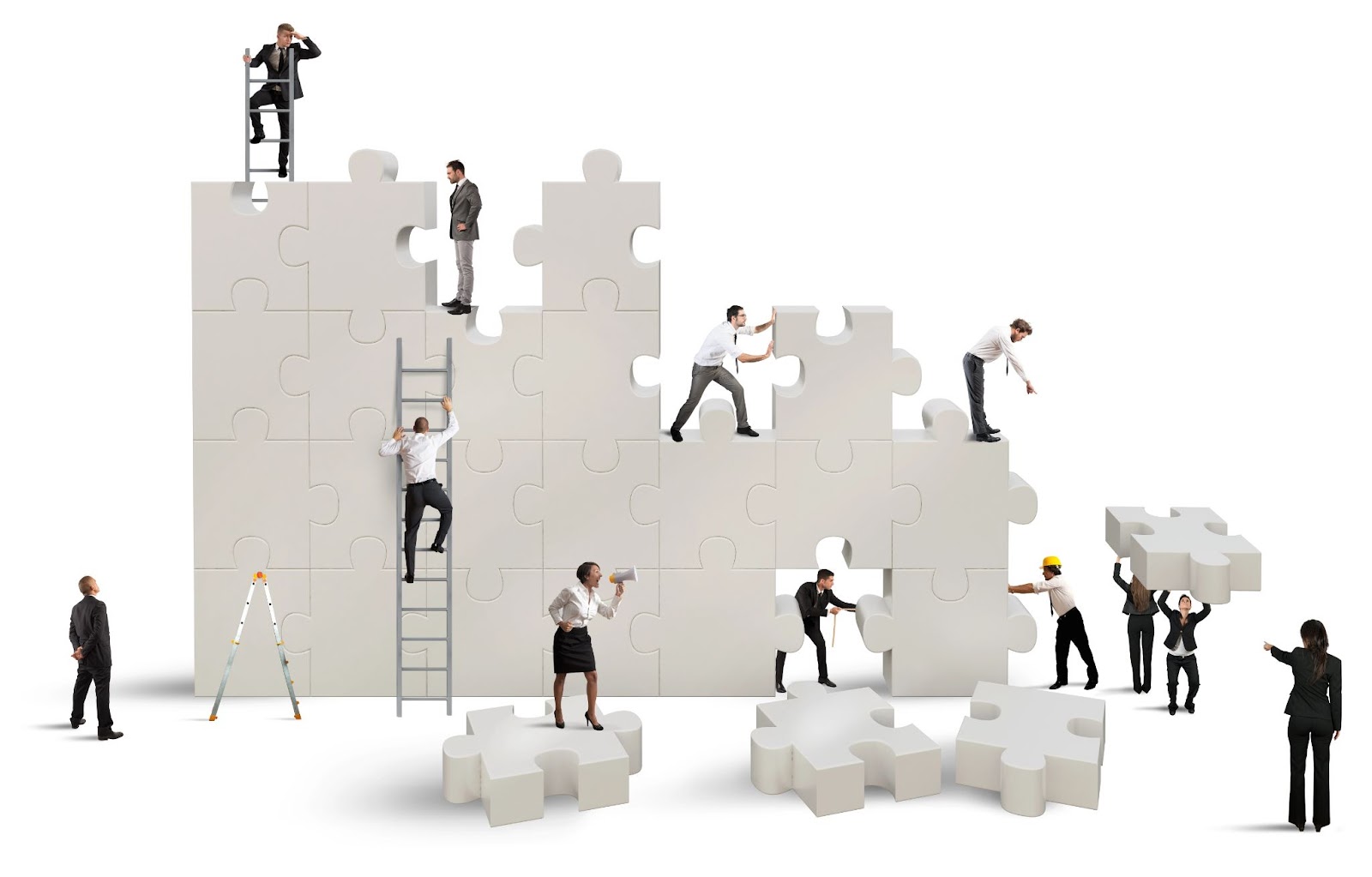 A virtual team bonding event shows a group of people in business attire assembling an oversized white jigsaw puzzle structure using ladders and scaffolding.