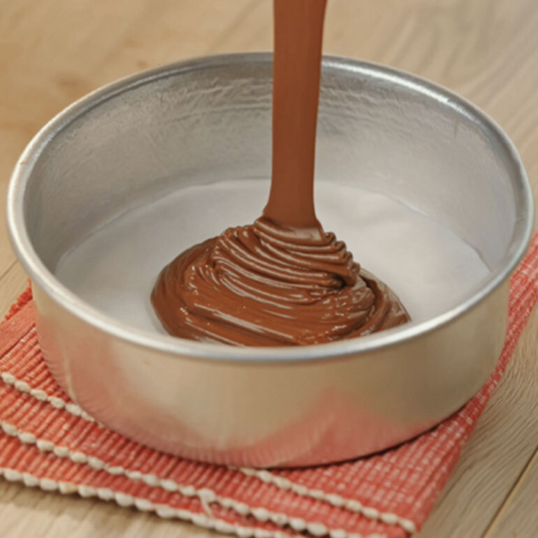 Pour batter into cake pan