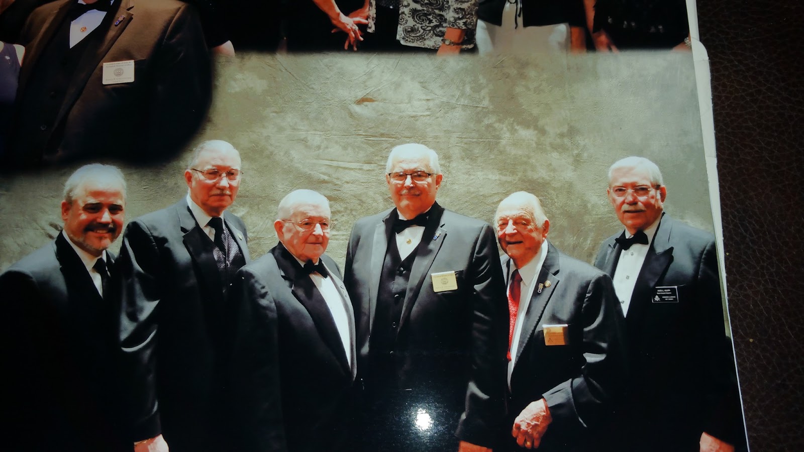 Image of Bro. Cokonougher and Past Grand Masters.