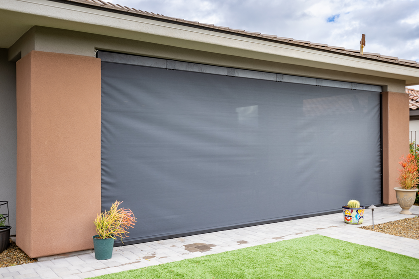 Solar shades covering entirety of back porch