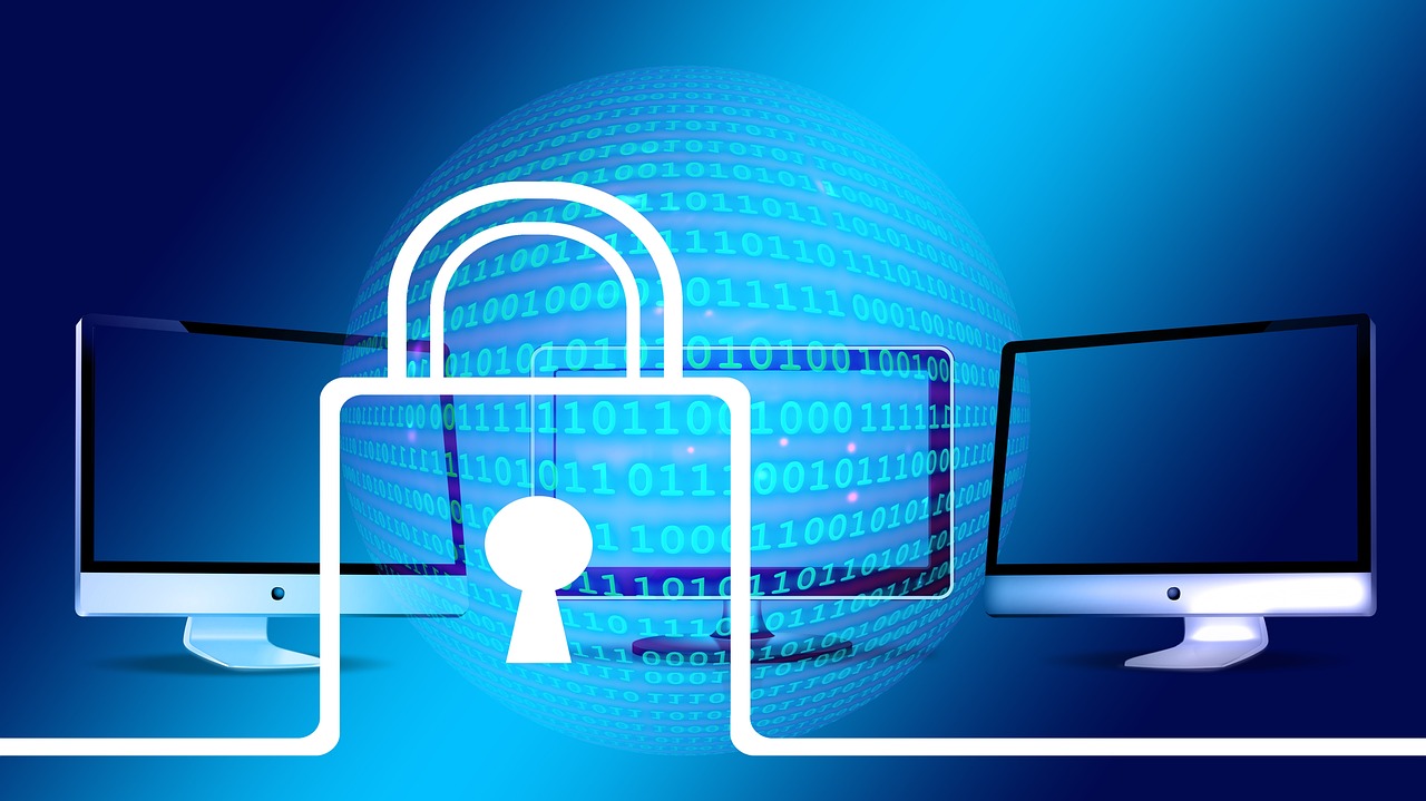 A digital illustration of a padlock overlaying three computer monitors with binary code in the background.