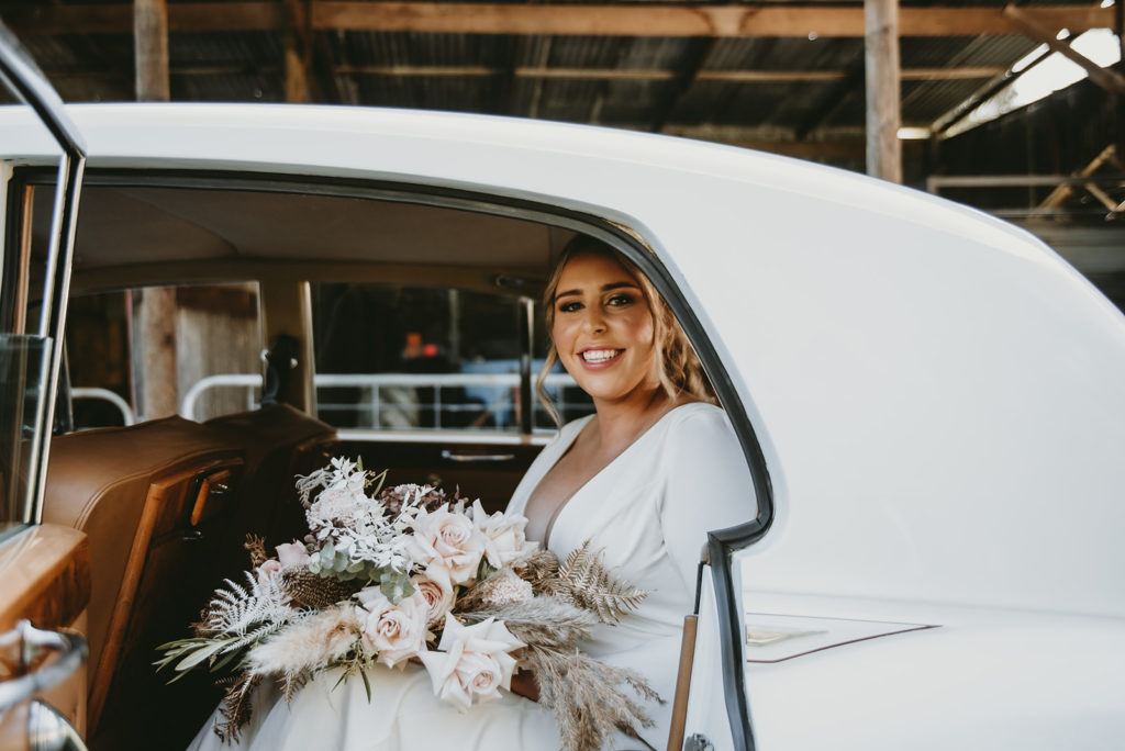 Beautiful boho bouquet in dusky pinks whites and browns