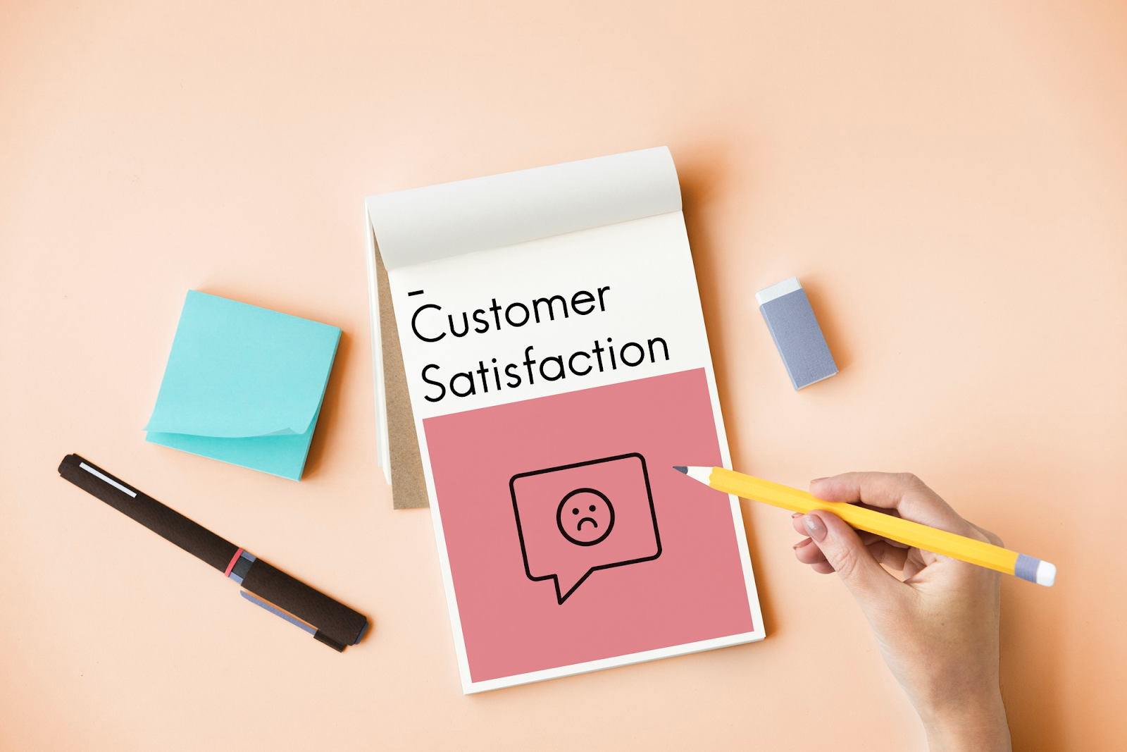 customer satisfaction written on a paper