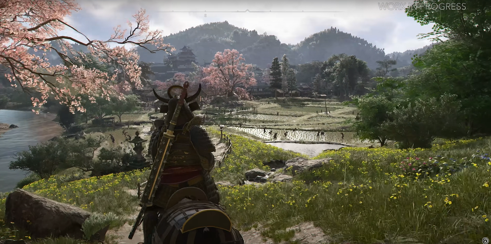 A scene from feudal Japan, showcasing intricate architecture with mountains looming in the distance.