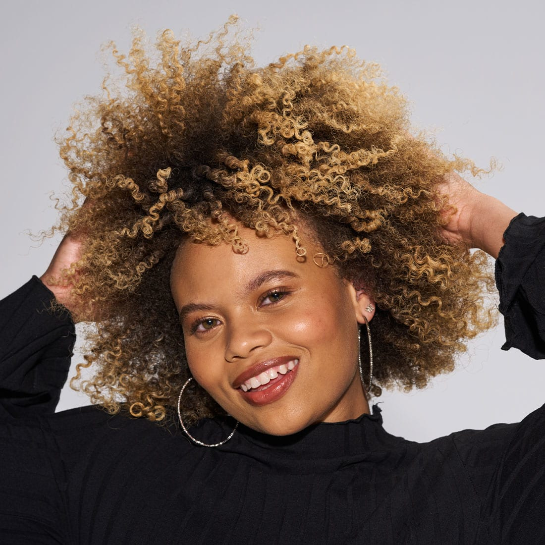 Picture of a lady flaunting her stunning curls 