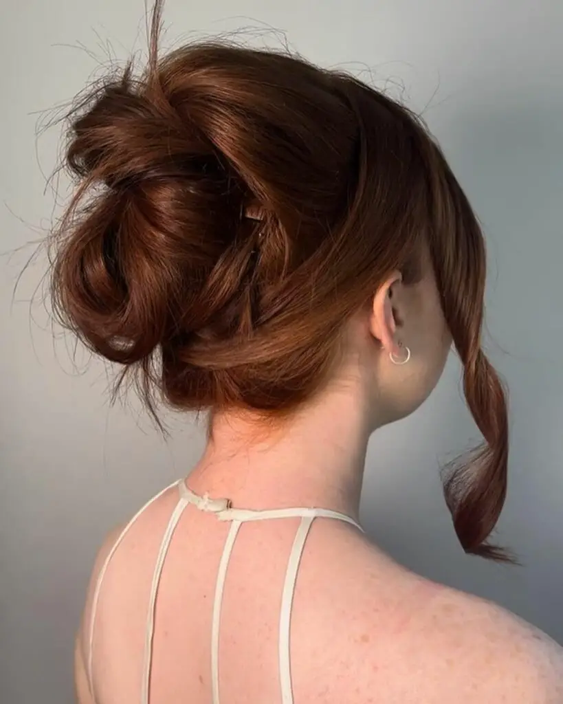 Prom hairstyles: Back view of the French Twist with Cascading Curls