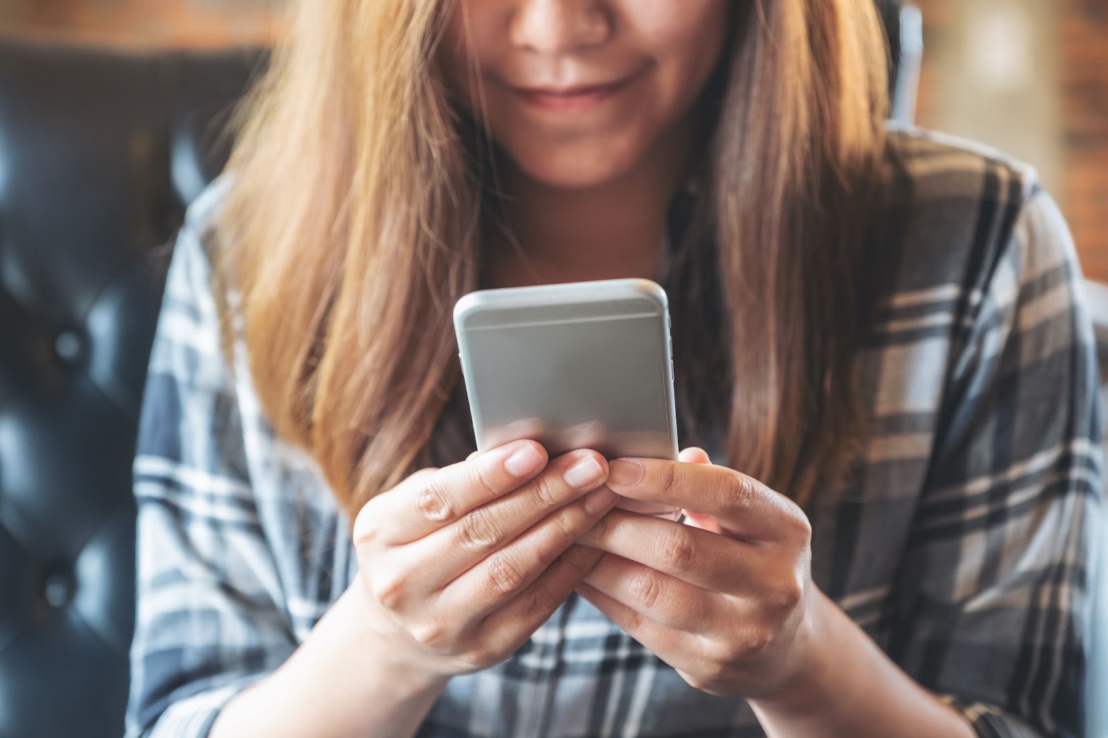 woman texting on a mobile phone