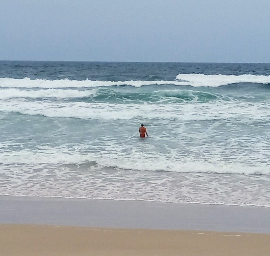 male in the ocean on the sunshine coast of australia