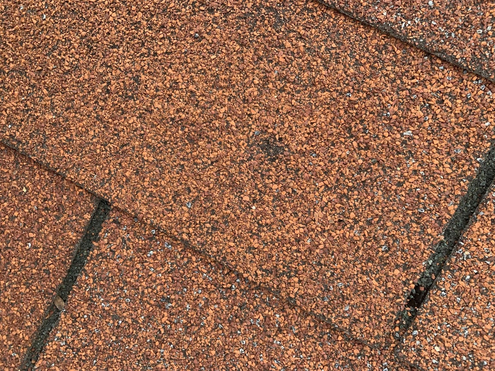 hail roof damage includes pock mark dents