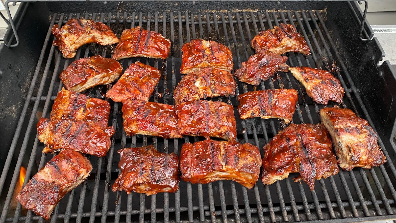 Ribs cut into smaller pieces with barbeque sauce