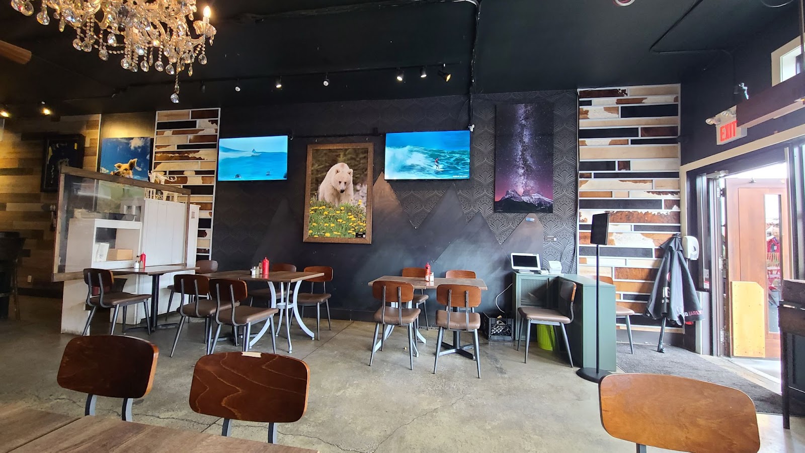 Graze Food & Drink Interior of open tables and artwork on the walls