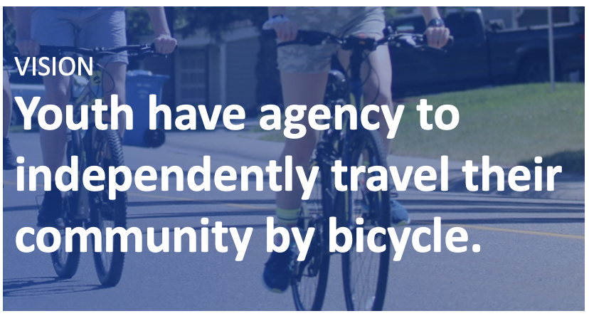 A person on a bicycle

Description automatically generated