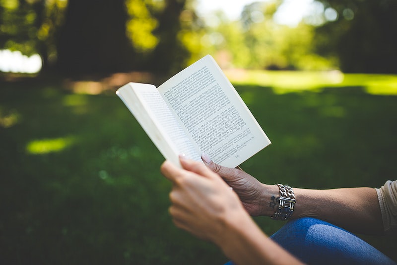 Girl reading a Stylish Book DP 