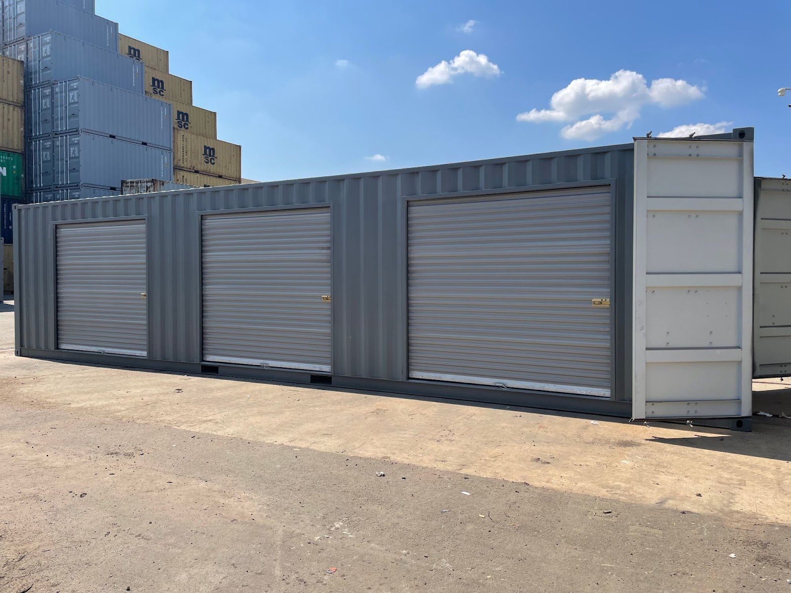 gray storage shipping container with multiple doors