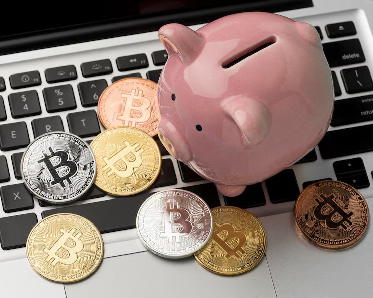 An image showing a piggy bank and crypto coins 