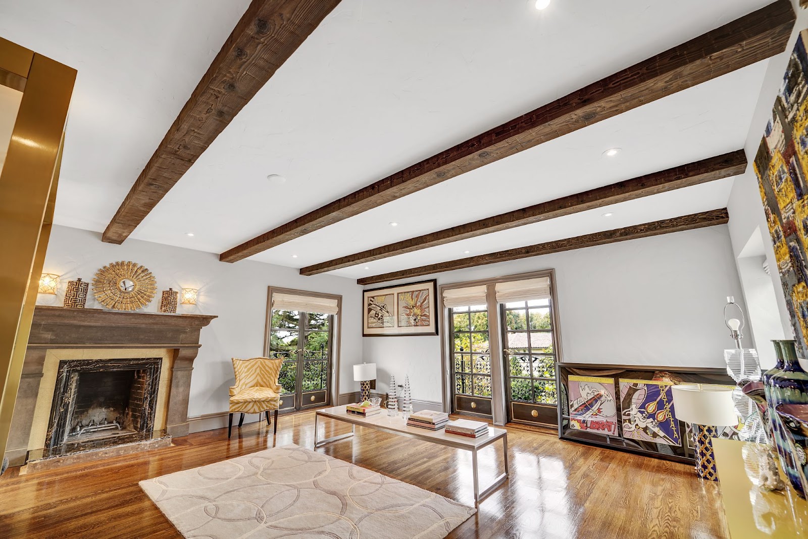 Rich Walnut Rough Hewn Faux Wood Beams adding elegance to a sophisticated great room ceiling