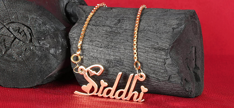 A necklace engraved with the name Siddhi