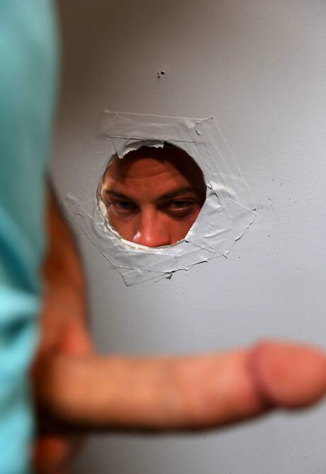 gay male blonde twink peeking through gloryhole near you ready to suck massive cock