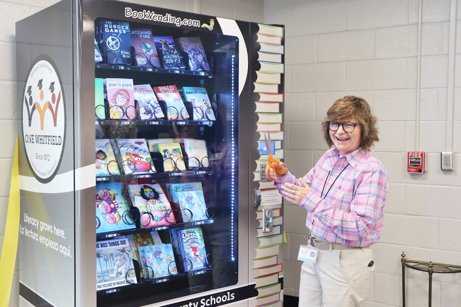 Amy Smith, teacher, with Whitfield Bookworm Vending machine