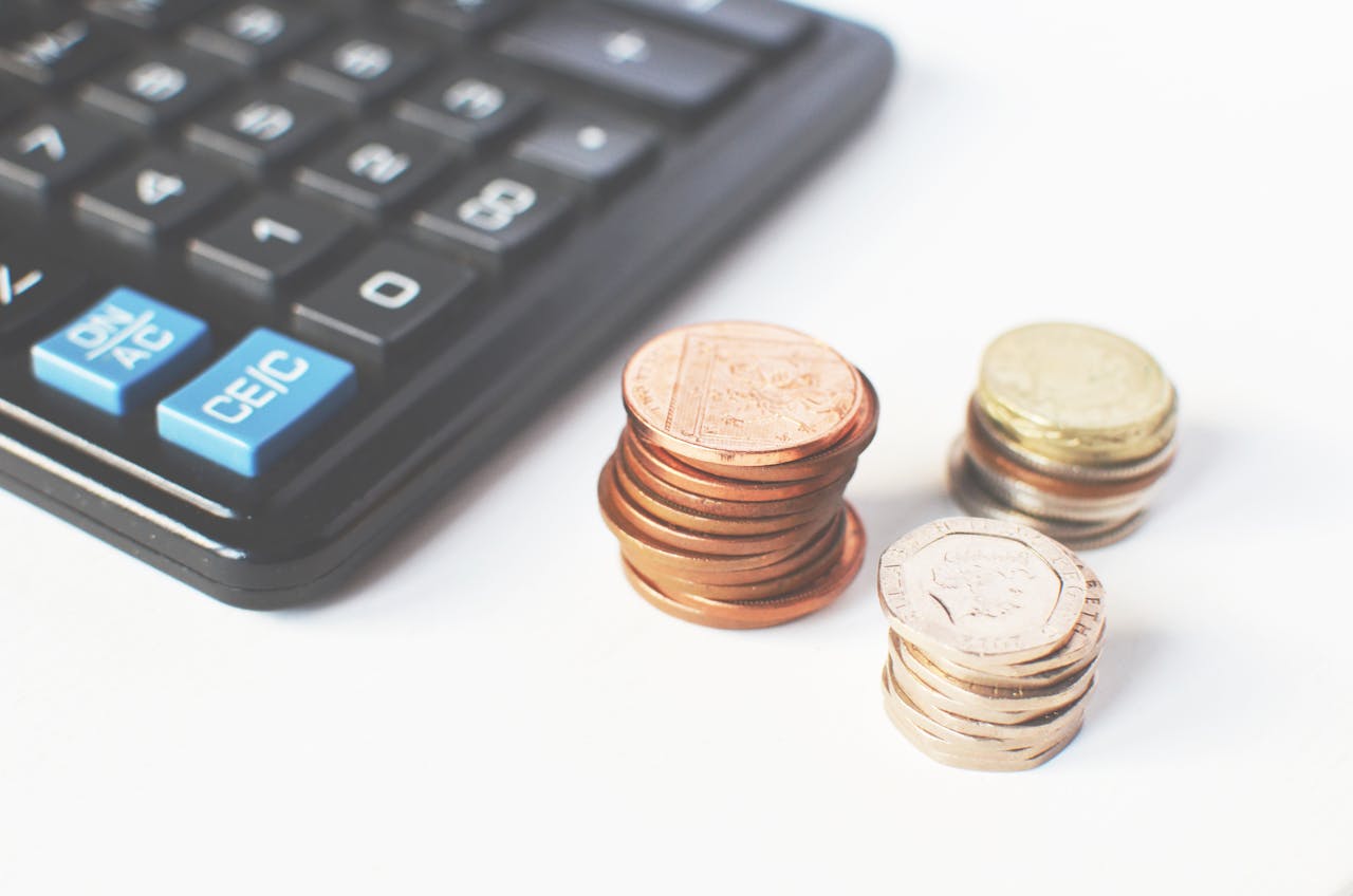 a calculator and coins