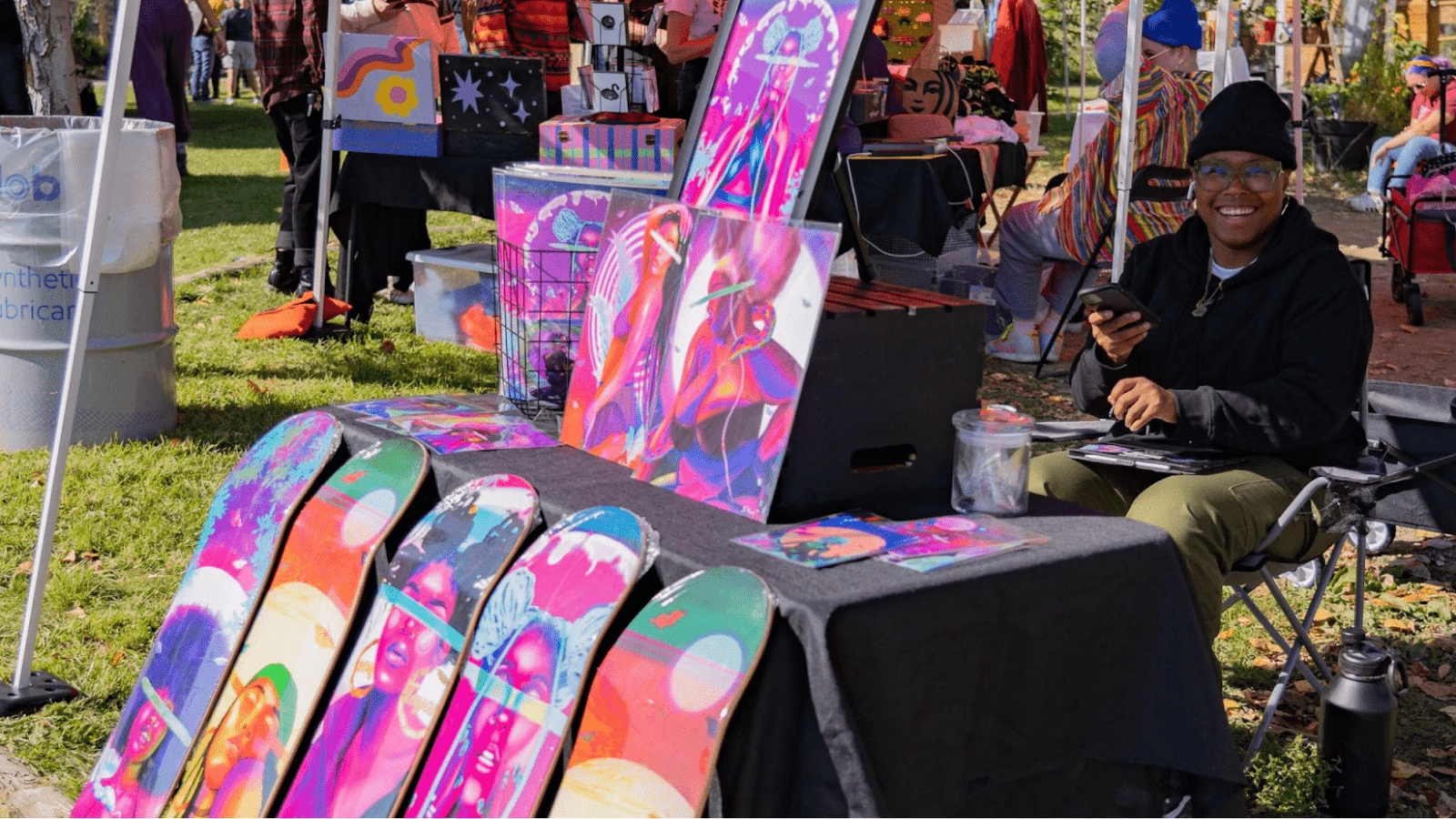 Person selling colorful skateboards