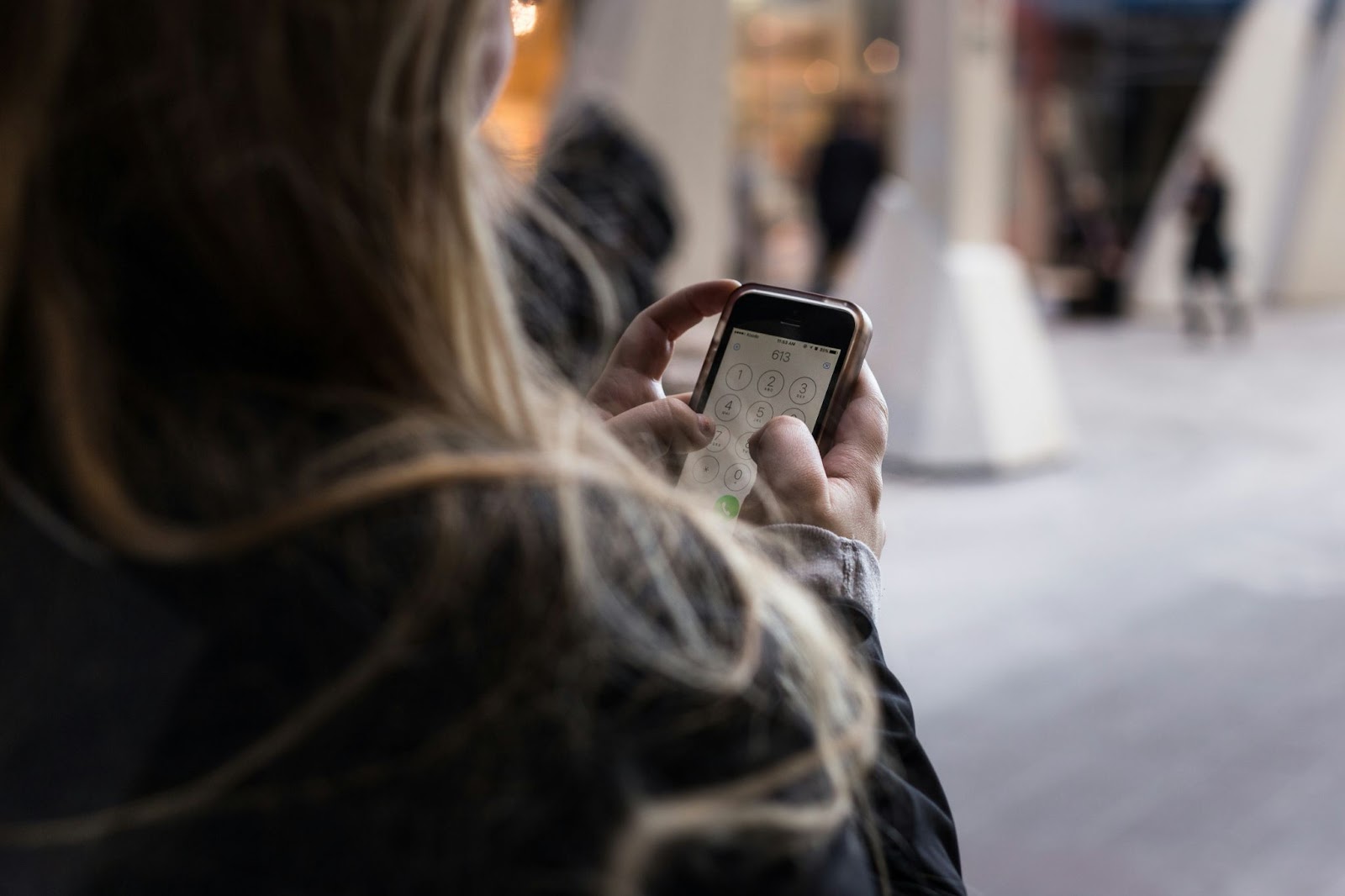 a person holding and using a smartphone