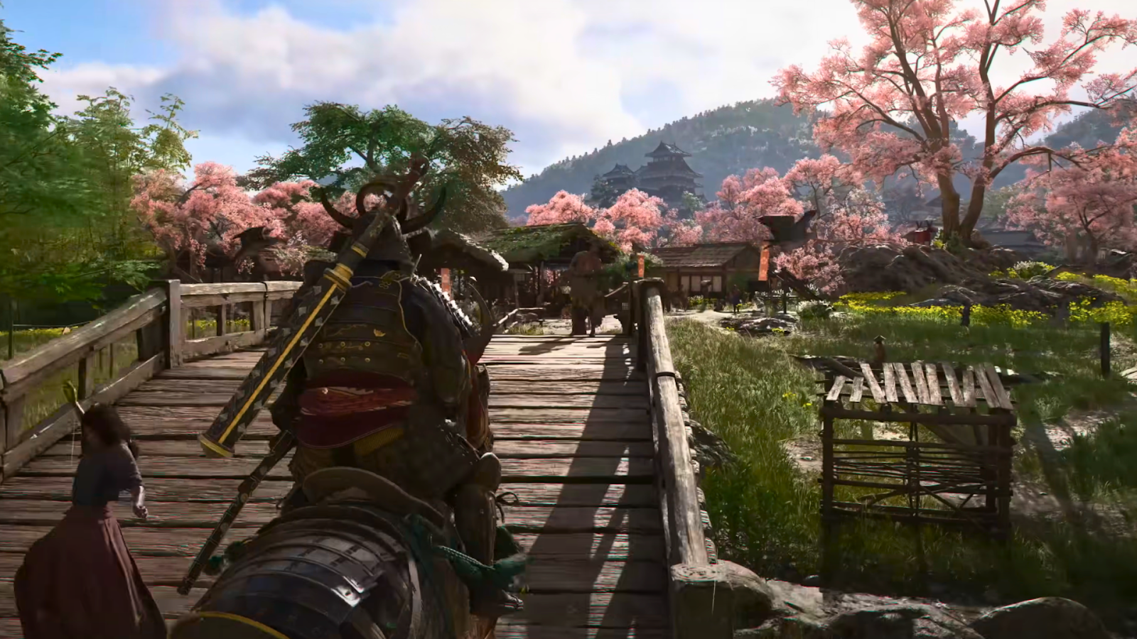 A depiction of feudal Japan, featuring detailed architecture with cherry blossoms in the distance.