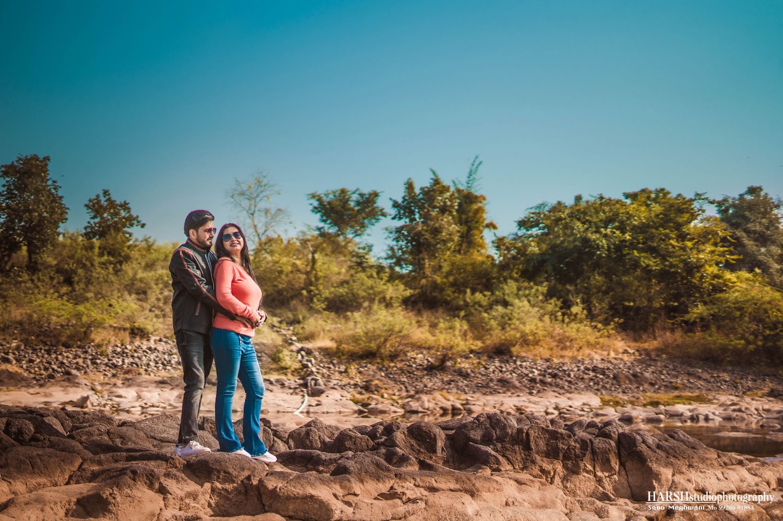 Pre-wedding shoot location at a waterfall in Mandu, near Indore. Captured by Harsh Studio Photography, a top-rated wedding photographer in Indore, known for their exceptional services. Keywords targeted: Wedding photographer, Best wedding photographers, Wedding photography services, Professional wedding photographers, Wedding photographer near me, Affordable wedding photographers Indore, Top-rated wedding photographers, Wedding photographer availability Indore, Wedding photographer portfolio Indore, Wedding photographer rates in Indore. Harsh Studio Photography specializes in creating stunning pre-wedding moments, showcasing their expertise and passion.