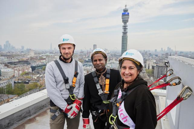 A group of people wearing safety gear

Description automatically generated