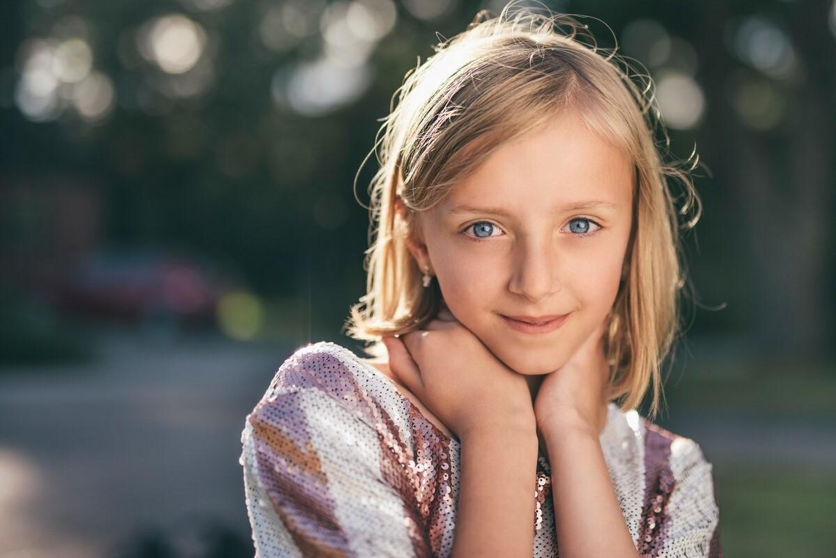 photo of a blonde girl with blue eyes