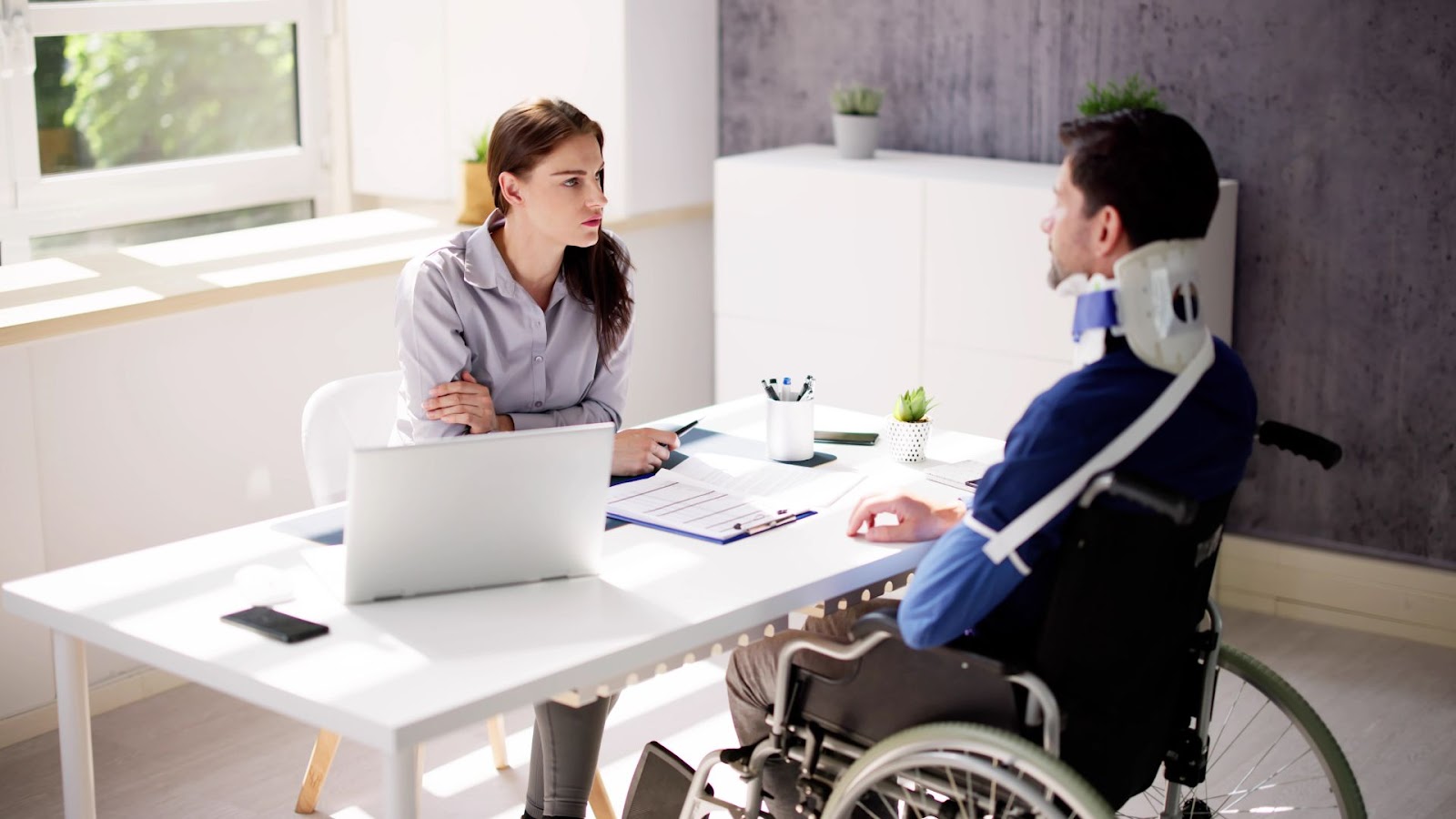 injured person consulting with an attorney