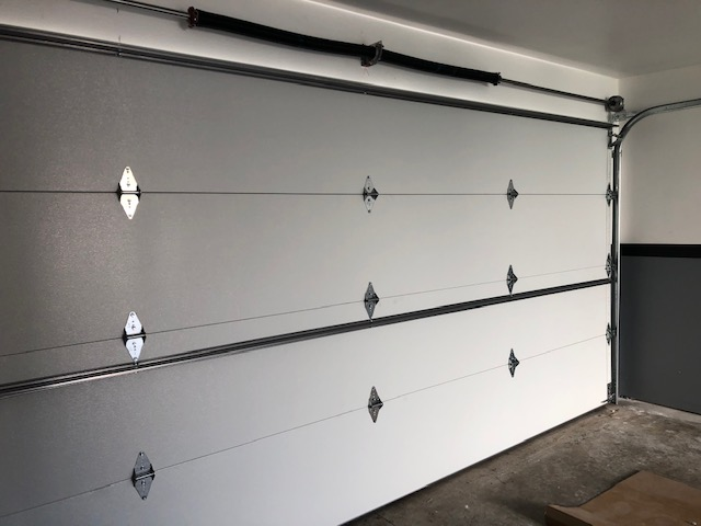 how much is a 16x7 garage door installed