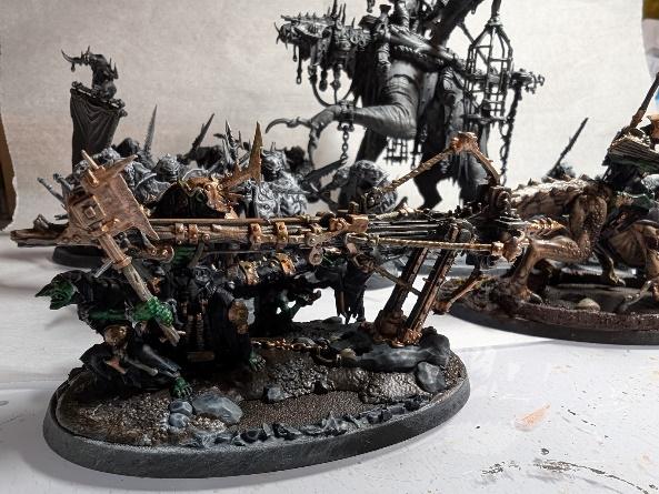 A group of figurines on a table Description automatically generated
