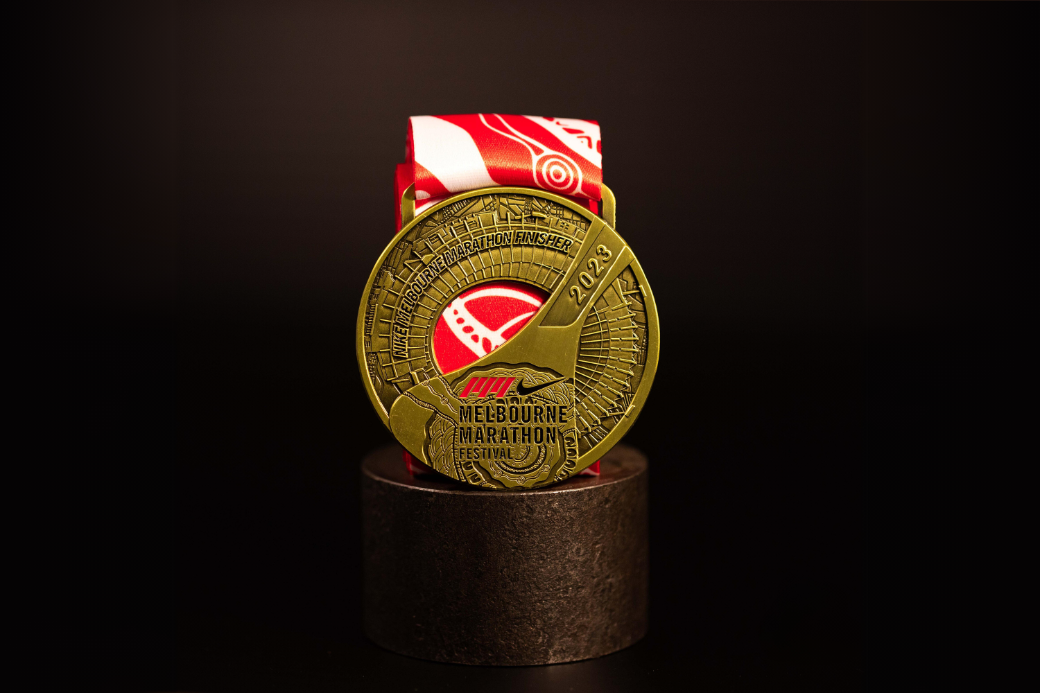 Custom medal for Melbourne Marathon with custom cut out bottle opener.