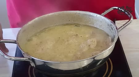 Chicken Kali Mirch simmering in a thick, creamy gravy until flavors blend.