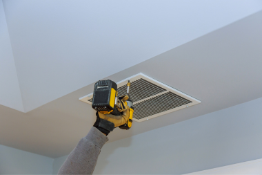 top ways to weatherproof your michigan home remodeler screwing in air ventilation custom built okemos