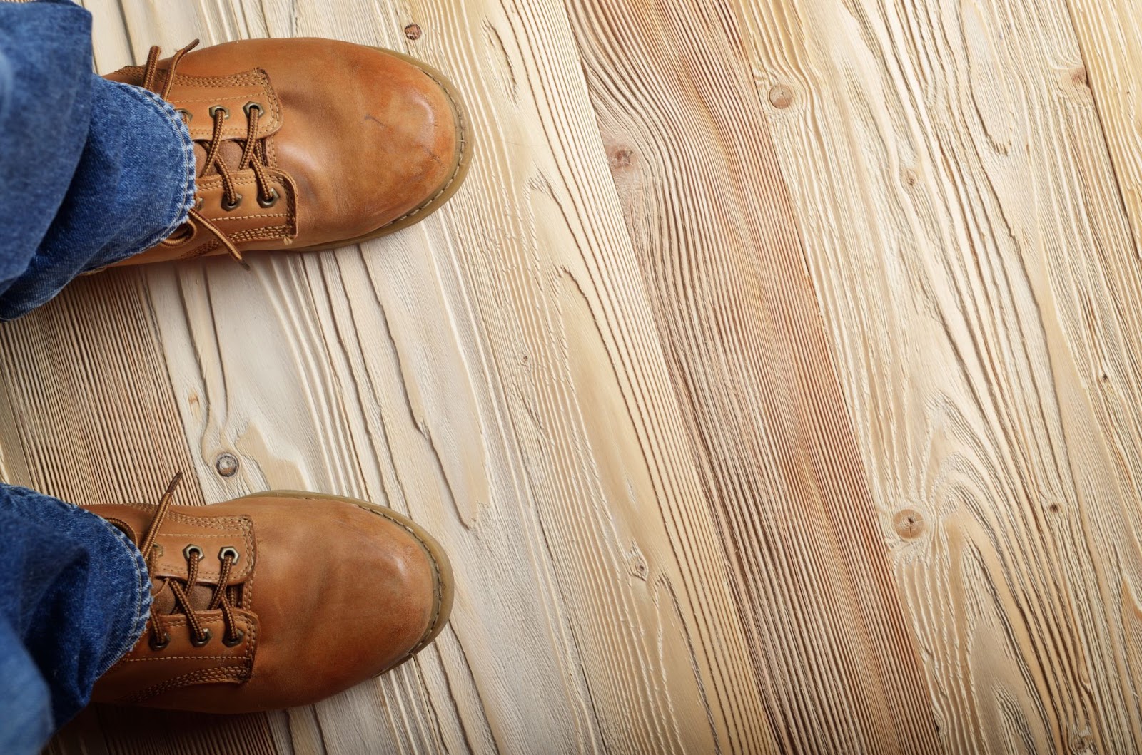 Shoes on a textured wooden floor. 