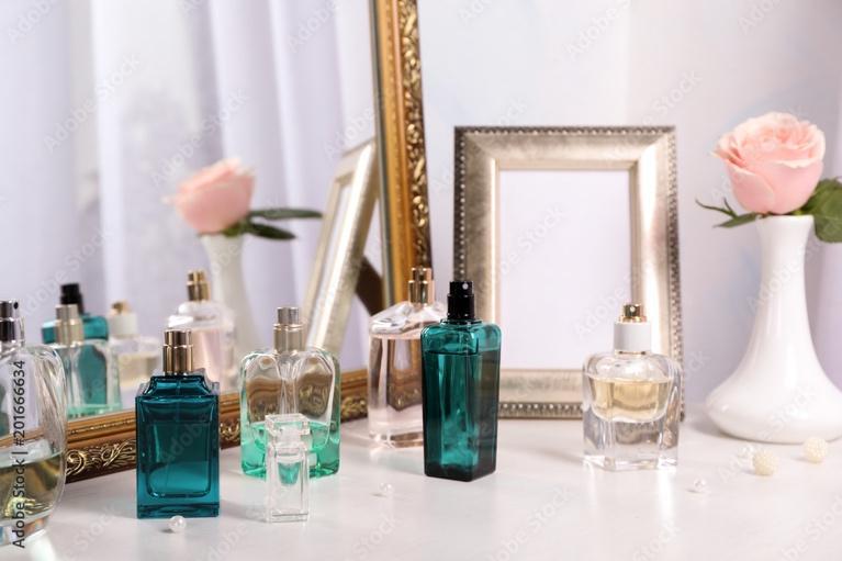 Perfume bottles on dressing table Stock Photo | Adobe Stock