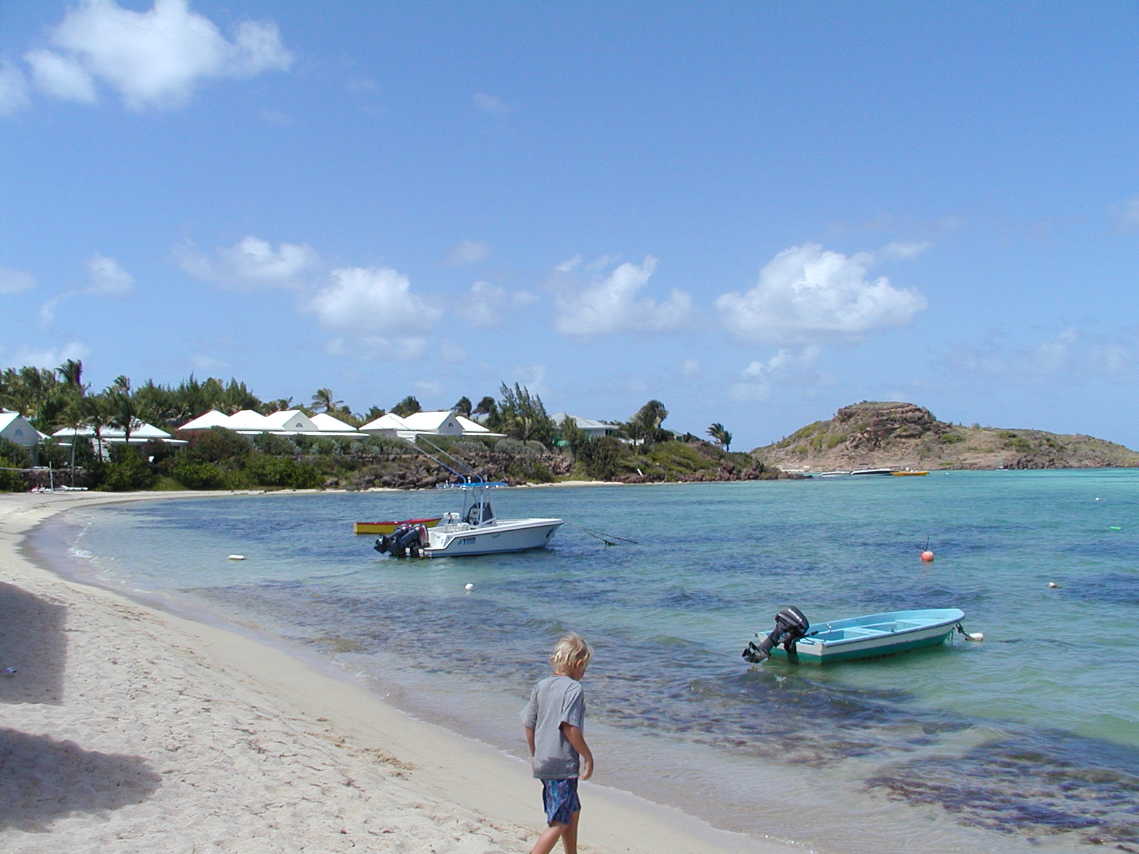 A woman strolling around a stunning, St. Barts island which is one of the safest Caribbean islands.
