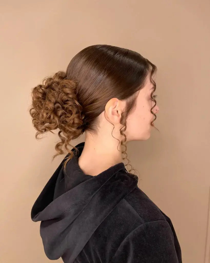 Side view of  a lady wearing her gorgeous hairdo with curls