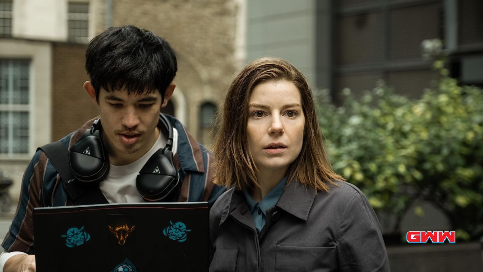 Aimee-Ffion Edwards and Christopher Chung on his laptop, Slow Horses Season 4 cast