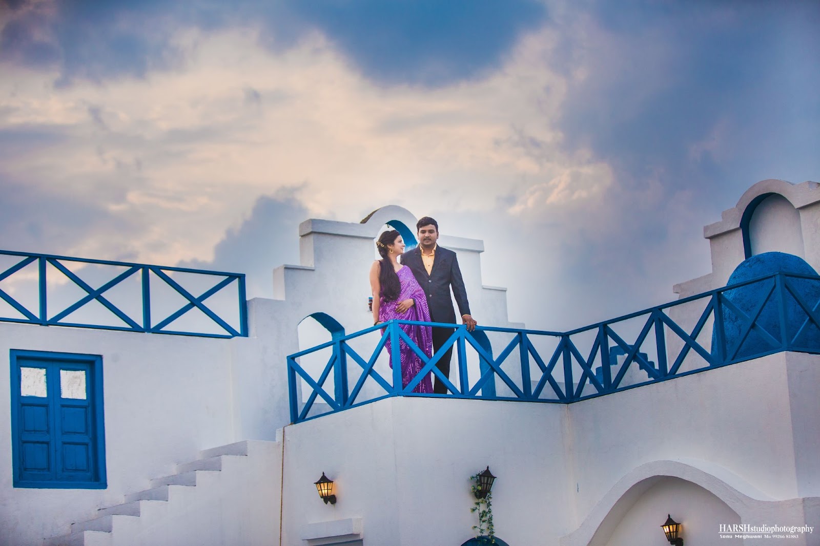 Pre-wedding shoot featuring a couple at Film City, Indore, capturing a heartfelt moment as they gaze at each other. This image was beautifully captured by Harsh Studio Photography in 2024. Known for their exceptional photography services, Harsh Studio Photography specializes in creating memorable and emotive wedding images that reflect the essence of each couple's love story.