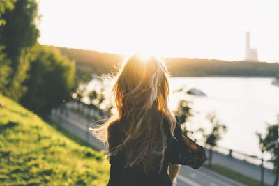 A woman outdoors, adapting to the Idaho lifestyle after the move.