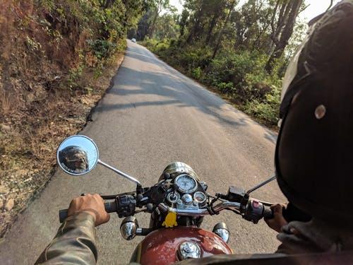 Free Man Riding Motorcycle Stock Photo