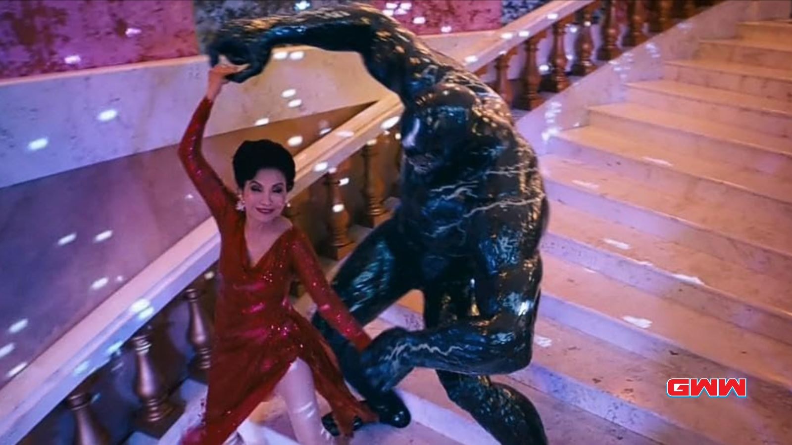 Tom Hardy and Peggy Lu as Venom and Mrs. Chen in Venom: The Last Dance