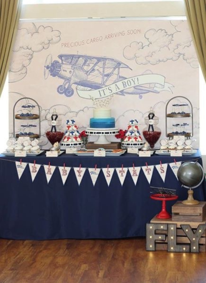 food table with it's a boy airplane theme