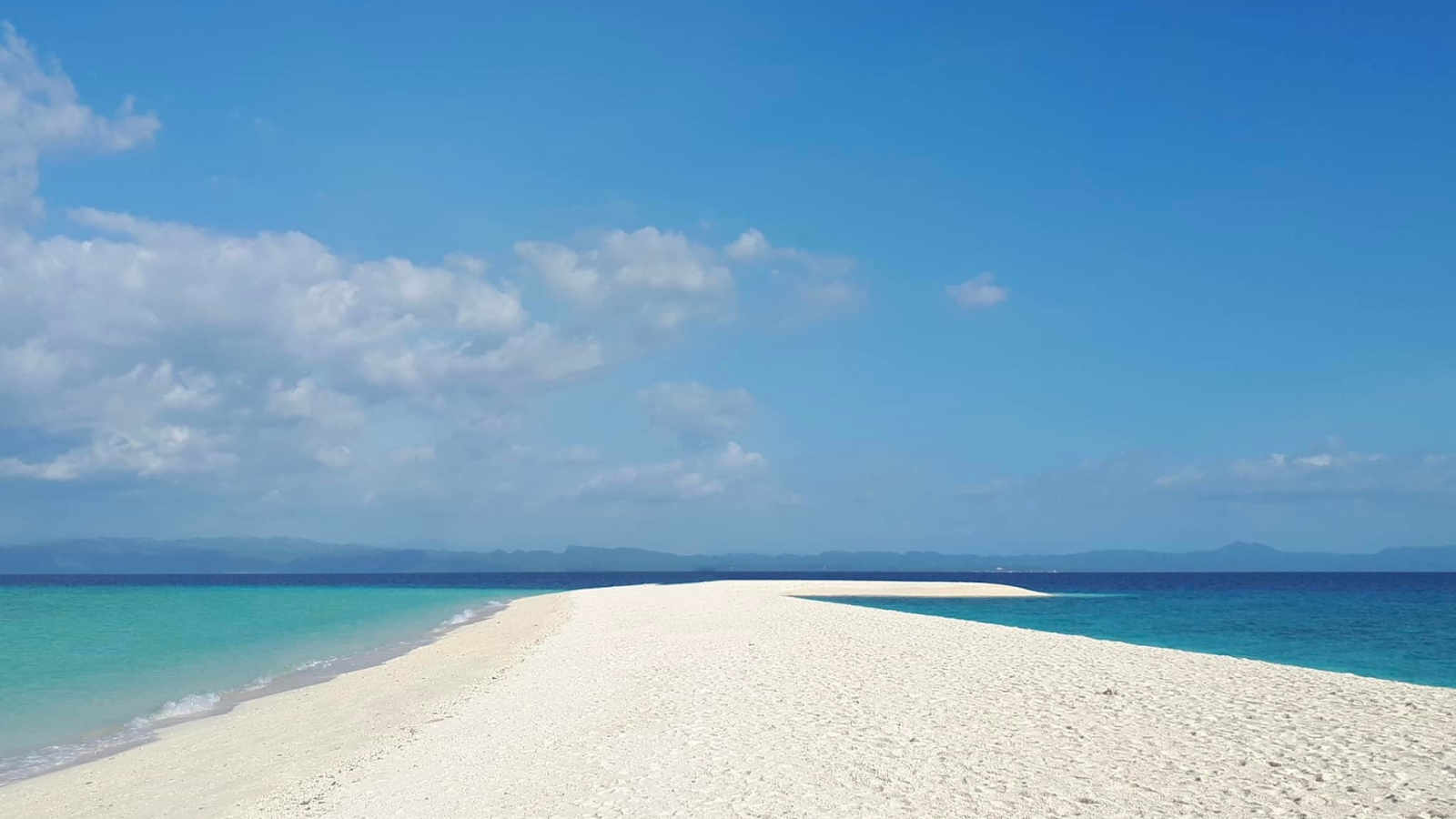 The white sandbar of a beach on Kalanggaman Island in the Philippines.