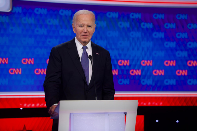 President Joe Biden stage during a commercial break in a presidential debate at CNN Studios.