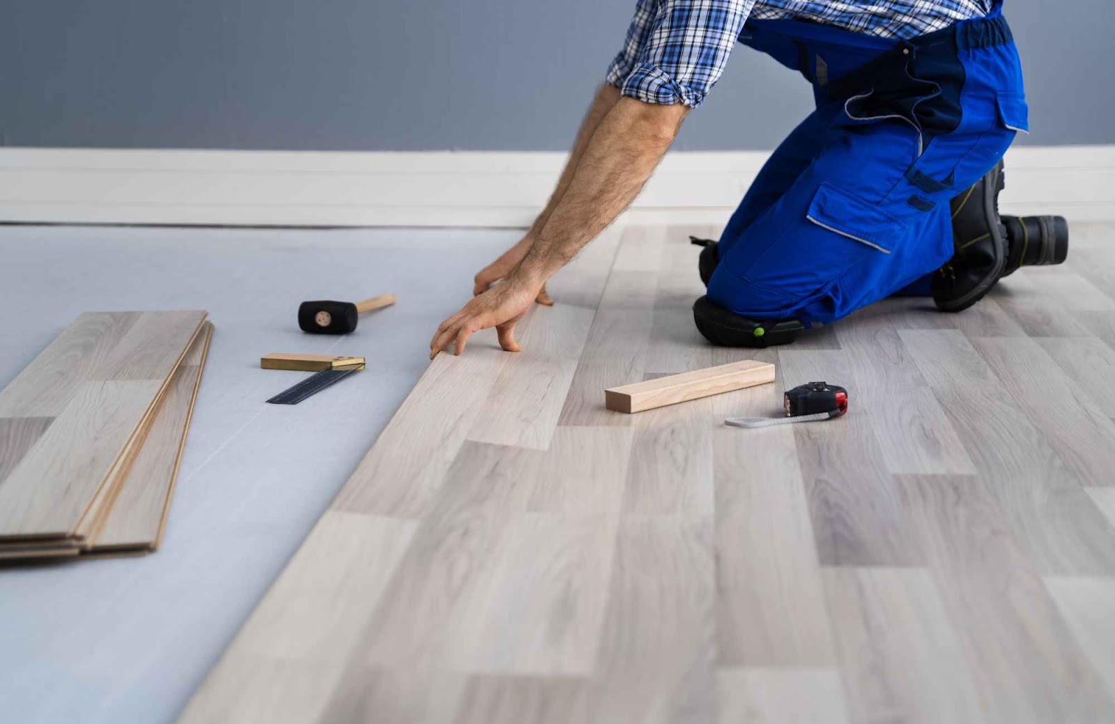 raashi-design-san-ramon-ca-building-or-buying-person-installing-new-flooring